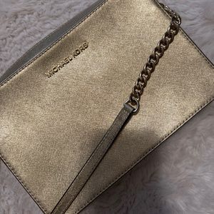 Michael Kors gold purse